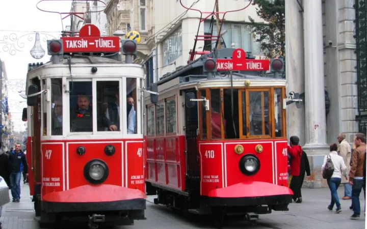 Red heritage trams on Istiklal Street in Istanbul
