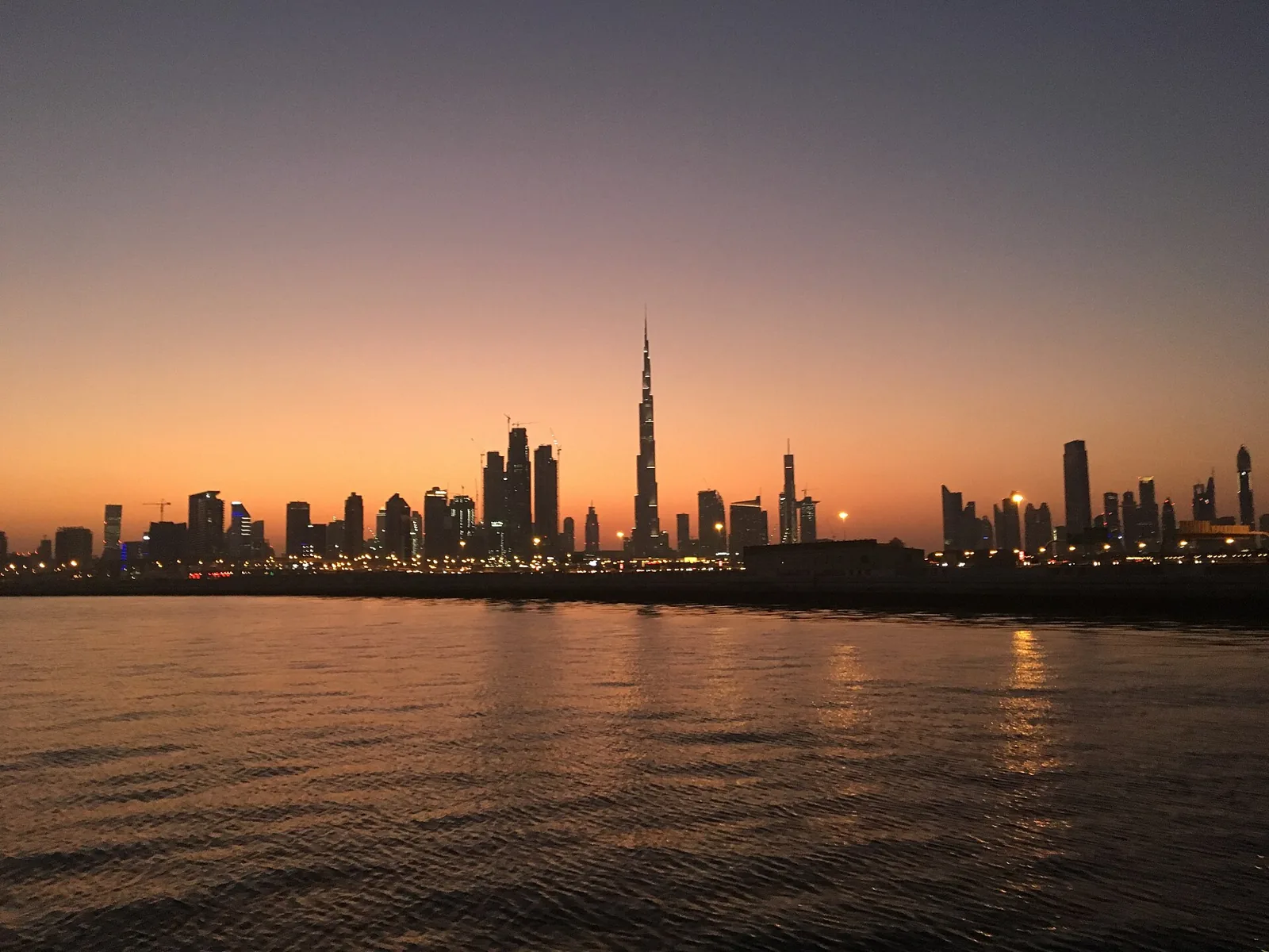 Dubai skyline with Burj Khalifa at sunset
