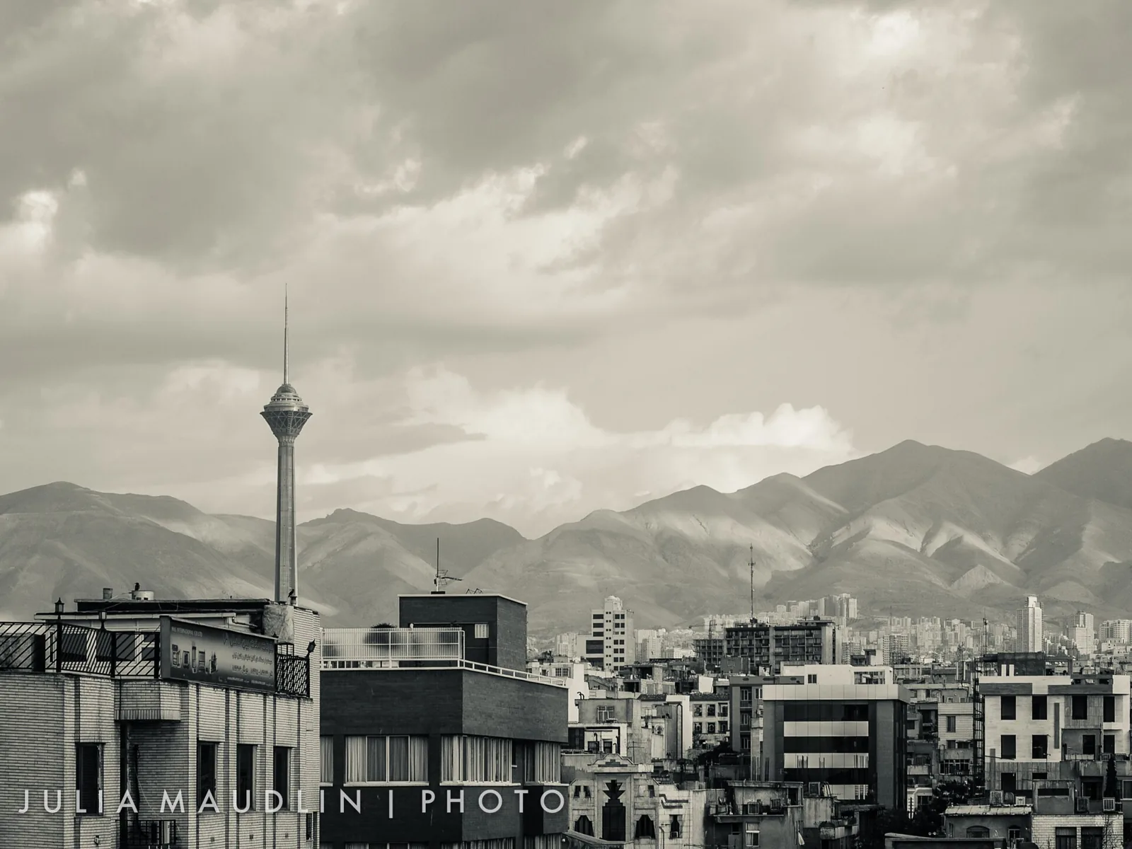 Tehran skyline with Milad Tower and mountains