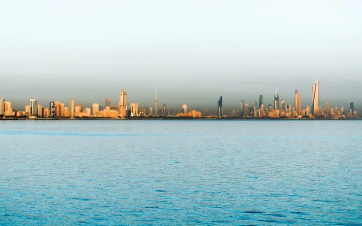 Kuwait City skyline photographed across the Gulf
