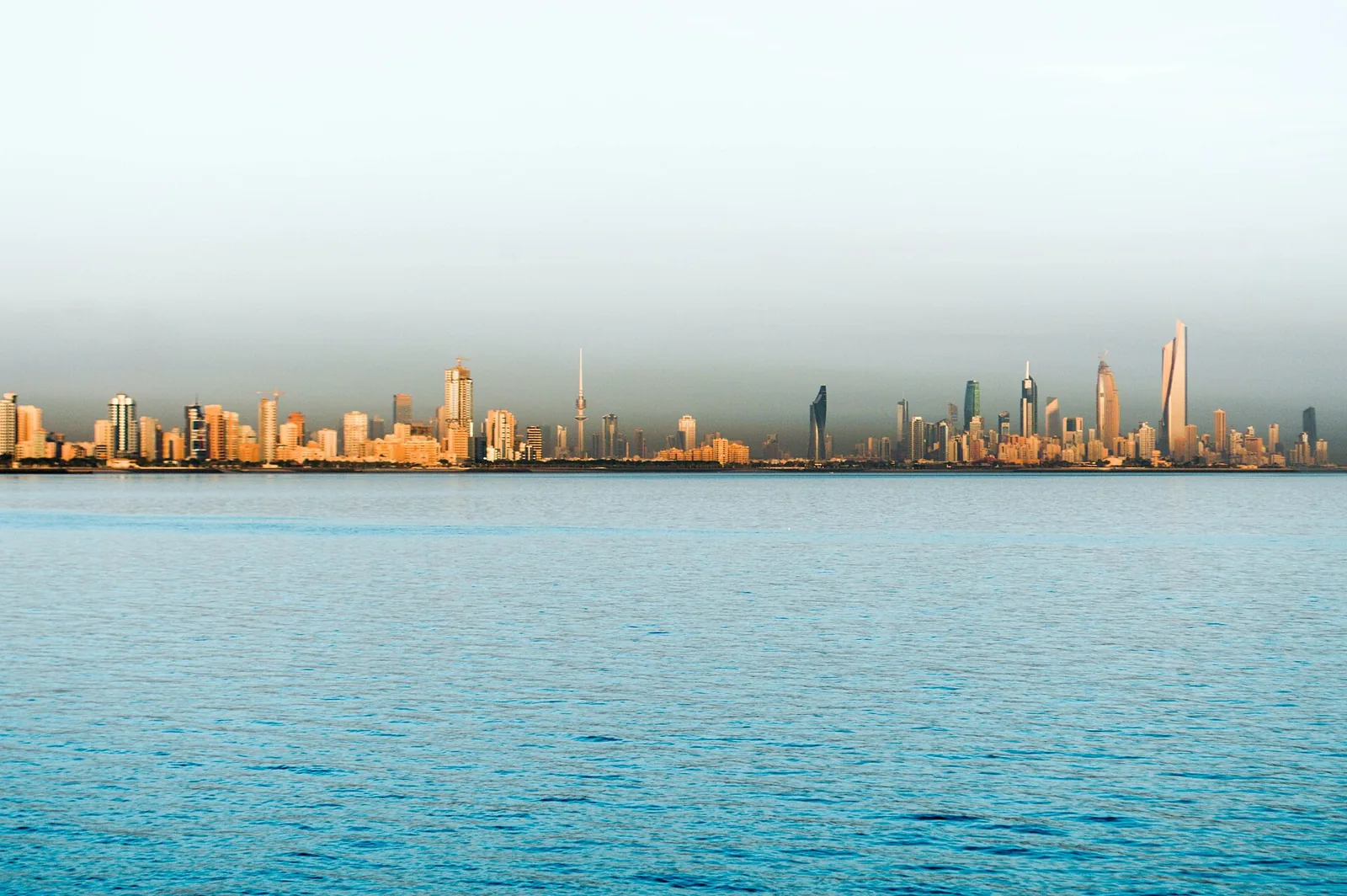 Kuwait City skyline photographed across the Gulf